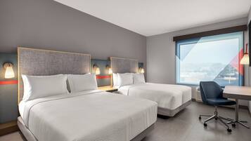 Pillow-top beds, blackout curtains, free WiFi, bed sheets