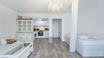 Een strijkplank/strijkijzer, wifi, beddengoed