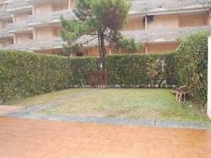 Property grounds - Three room flat with garden-Beahost (Bibione)