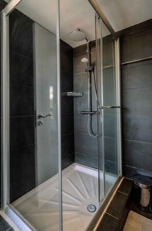 Deluxe Apartment, Air conditioning, Mountain View | Bathroom shower - Chic City Center Stay With Stunning View (Nicosia)