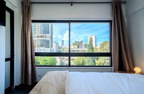 Deluxe Apartment, Air conditioning, Mountain View | Desk, laptop workspace, blackout drapes, free WiFi - Chic City Center Stay With Stunning View (Nicosia)