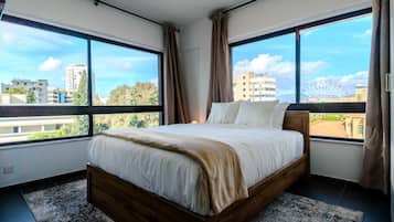 Deluxe Apartment, Air conditioning, Mountain View | Desk, laptop workspace, blackout curtains, free WiFi