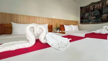 Executive Quadruple Room, Garden View | Hypo-allergenic bedding, memory-foam beds, in-room safe, desk