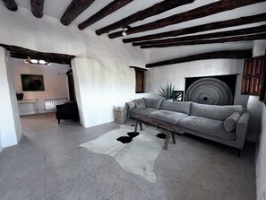 Smart TV, fireplace, foosball, books