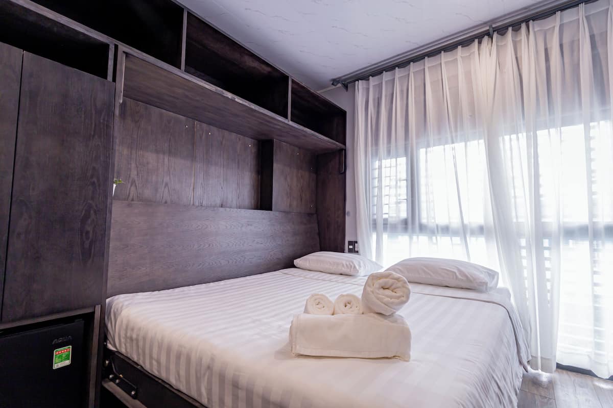 Economy Double Room | Desk, laptop workspace, blackout curtains, iron/ironing board