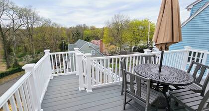 Tranquil modern upstairs apt. Walk to restaurants & beach! Off-street parking,