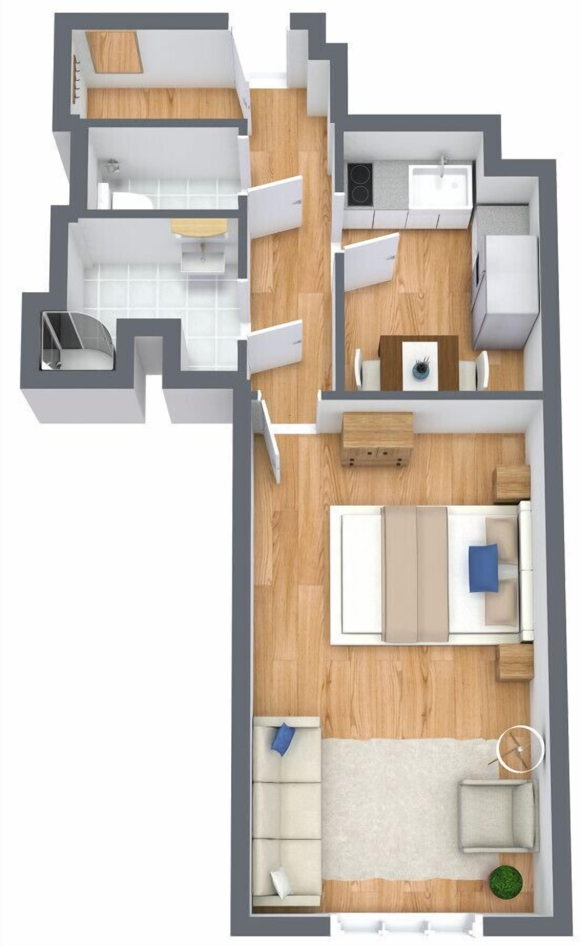 Un appartement de deux chambres comprenant un salon, un coin repas, une cuisine et une salle de bain.
