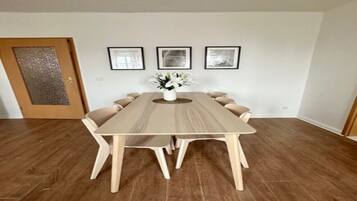 Apartment, 2 Bedrooms (360762) | Living area | 60-inch flat-screen TV with cable channels
