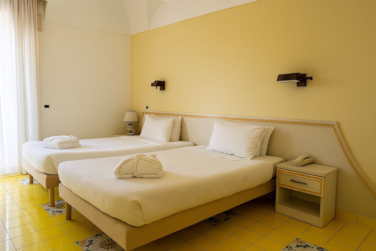 Comfort Room | 1 bedroom, minibar, in-room safe, free WiFi