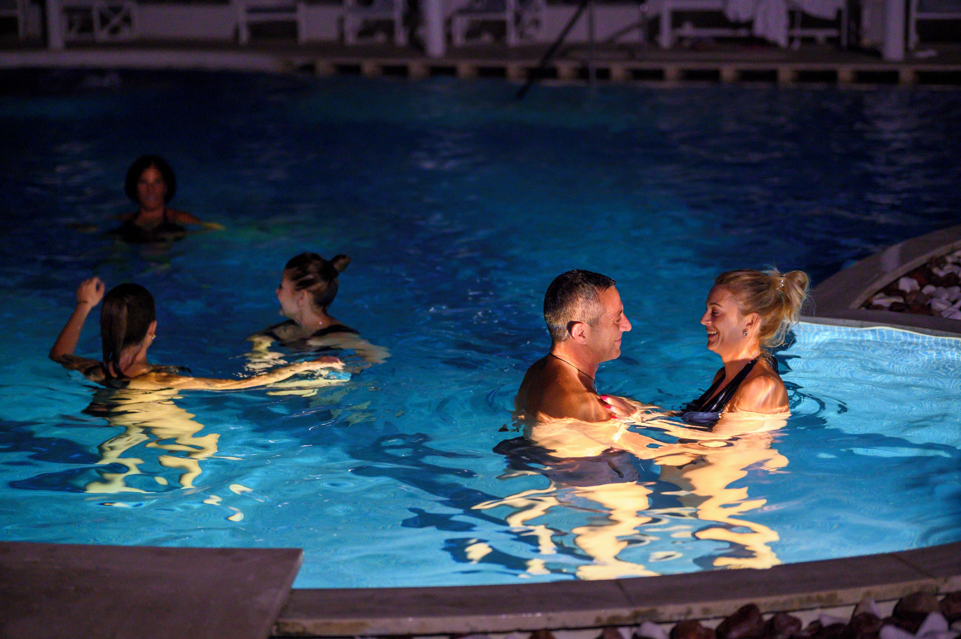 Seasonal outdoor pool, open 9:00 AM to 7:00 PM, pool umbrellas