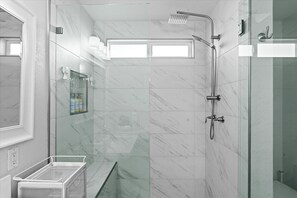 Shower, hair dryer, towels