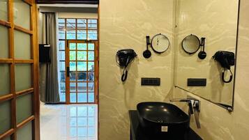 Shower, hair dryer, towels, soap