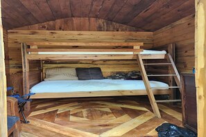 1 bedroom, bed sheets - 1 of 2 Enchanting 1 room cabins in Shapleigh, ME located on sloaping forest land (Shapleigh)