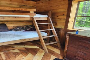 1 bedroom, bed sheets - 1 of 2 Enchanting 1 room cabins in Shapleigh, ME located on sloaping forest land (Shapleigh)