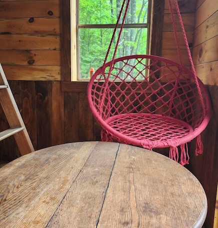 Property grounds. 1 of 2 Enchanting 1 room cabins in Shapleigh, ME located on sloaping forest land