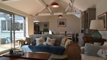 Casa família, vista para o jardim | Área de estar