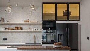 Coffee/tea maker, fridge, microwave, oven