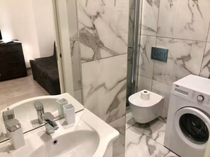 Hair dryer, towels, soap, toilet paper