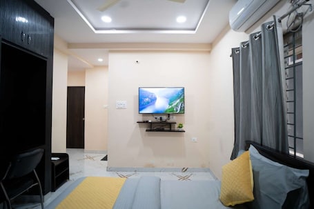 Premier Room | Iron/ironing board, free WiFi. Yellow Bells Gachibowli