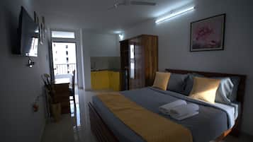 Studio, Kitchenette | 2 bedrooms, in-room safe, iron/ironing board, free WiFi