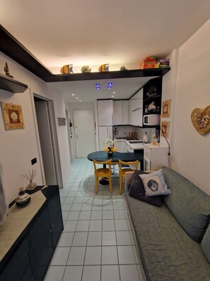 Apartment, 1 Bedroom, Terrace | Living room - Cozy Stay With Terrace and Shared Pool (San Michele al Tagliamento)
