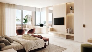 Un dormitorio moderno con una cama grande, un escritorio y un televisor.