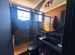 Shower, hair dryer, towels, toilet paper