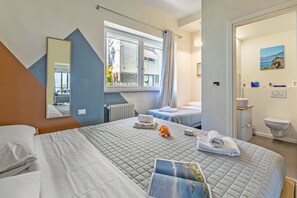 Family Apartment, Multiple Bedrooms, 2 Bathrooms, Lakeside (Suono del Lago 100m from Lake) | 2 bedrooms, laptop workspace, iron/ironing board, free WiFi - Suono del Lago 100m From Lake (Meina)