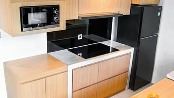 Premium Apartment, Pool View | Private kitchen | Full-size fridge, microwave, stovetop