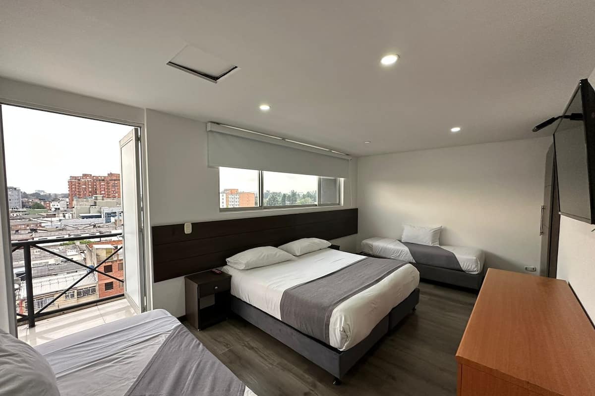 Quadruple Room, Balcony, City View | Desk, blackout curtains, iron/ironing board, free WiFi