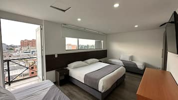 Quadruple Room, Balcony, City View | Desk, blackout drapes, iron/ironing board, free WiFi