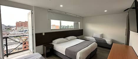 Quadruple Room, Balcony, City View | Desk, blackout drapes, iron/ironing board, free WiFi
