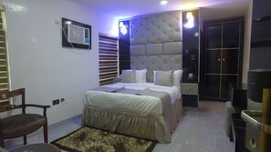 Economy Room, Balcony, City View | Desk, laptop workspace, blackout curtains, soundproofing - Emsworth Hotels and Apartments  (Abuja)