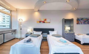 4 bedrooms, desk, iron/ironing board, travel cot