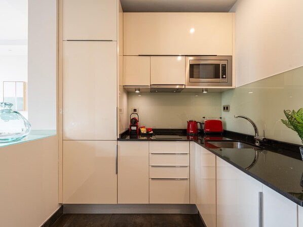 Fridge, microwave, dishwasher, coffee/tea maker