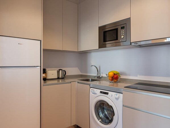 Fridge, microwave, coffee/tea maker, toaster