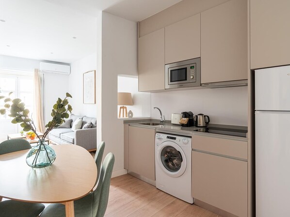 Fridge, microwave, coffee/tea maker, toaster