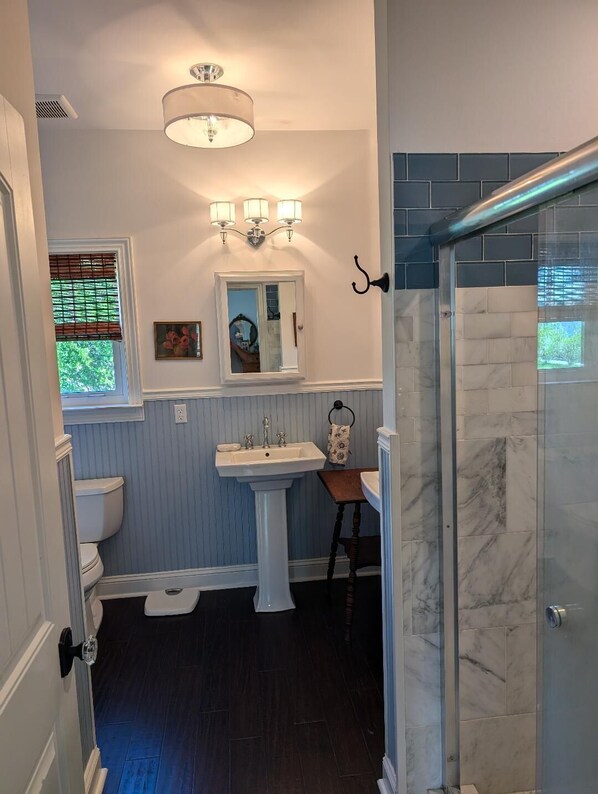 Shower, hair dryer, towels, soap