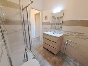 1 bedroom, blackout drapes, soundproofing, iron/ironing board