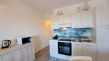 1 bedroom, blackout drapes, soundproofing, iron/ironing board