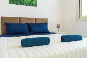 2 habitaciones, tabla de planchar con plancha, cuna de viaje y wifi 