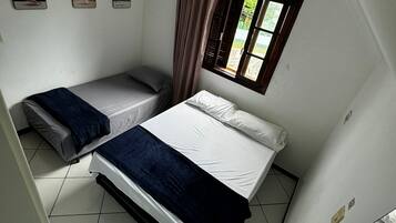 Basic Triple Room, Courtyard View | Iron/ironing board, free WiFi