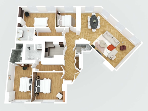 Ein 3D-Grundriss eines Hotelzimmers mit einem Bett, einer Sitzecke mit Tisch und Stühlen, einem Badezimmer und einer Küchenzeile.