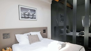 2 habitaciones, tabla de planchar con plancha, cuna de viaje y wifi