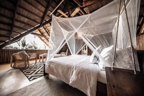 Premium bedding, down comforters, memory foam beds, in-room safe - The Beach House Ocam Ocam (Busuanga)