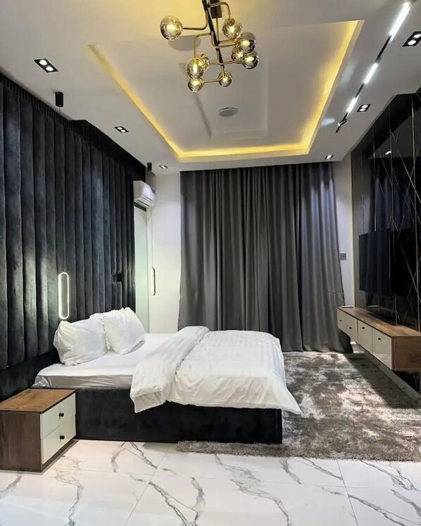 Family Apartment, Balcony, City View | 1 bedroom, in-room safe, desk, laptop workspace