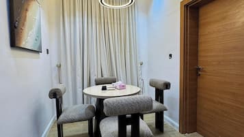 Family Apartment, Balcony, City View | Dining room