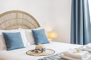 2 habitaciones, tabla de planchar con plancha y cuna de viaje 