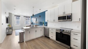 Fridge, dining tables - Landing | Modern 1BD, Rooftop Lounge, Gym (Denver)