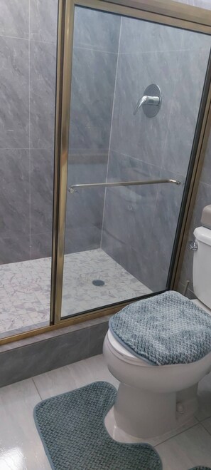 Shower, hair dryer, towels, soap - Exquisite 3 bedroom family home -Pristine stay- (Canefield)